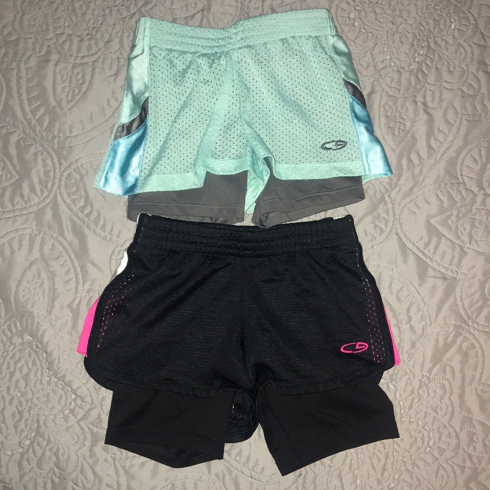 Bundle of athletic shorts with spandex layer